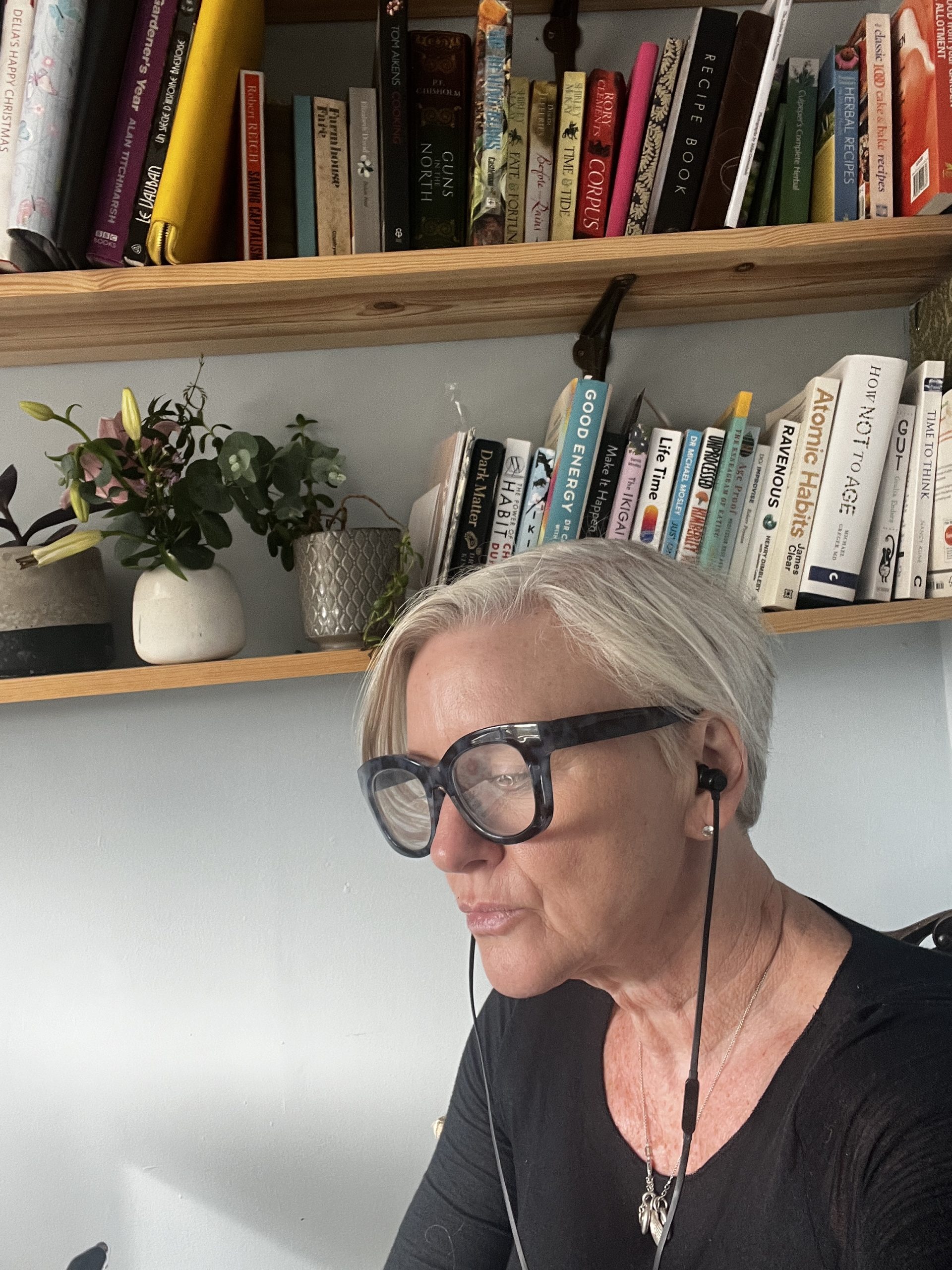 Rebecca J Farrington writing a weekly newsletter