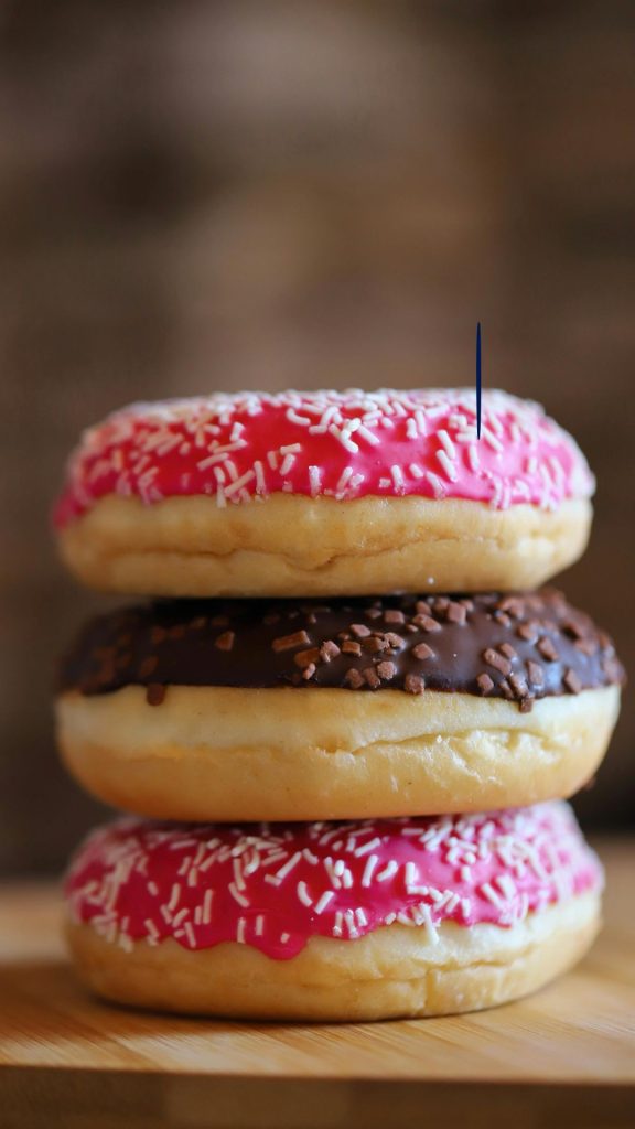A stack of iced donuts